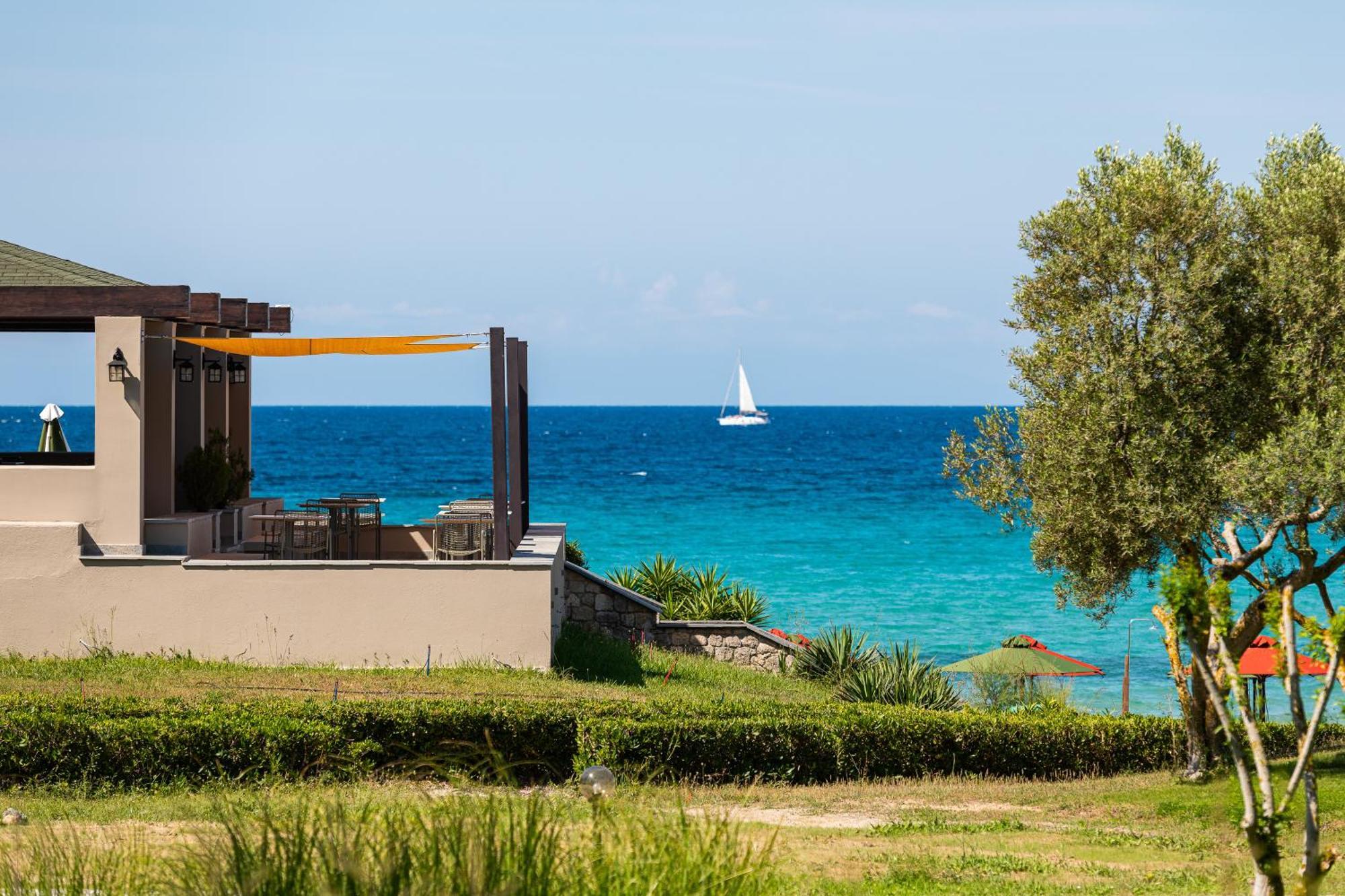 Simantro Resort Sani  Extérieur photo View of the sea from the hotel